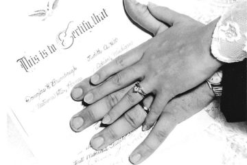 wedding rings and marriage certificate