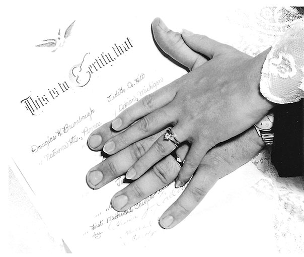 wedding rings and marriage certificate