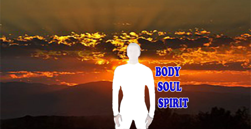 white silhoutte man with words body, soul, spirit