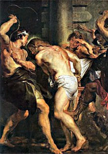 Jesus being beaten with crown of thorns on His head.