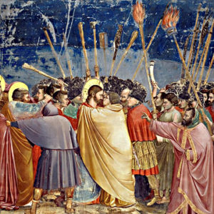 Judas betrays Jesus with kiss in Garden of Gethsemane